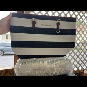 Michael Kors purses black/white, and a tan purse. They are roughly 18” by 11”.